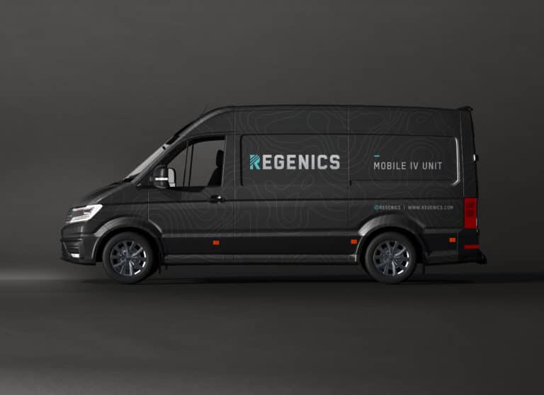 A black van with the words "Regenics" and "MOBILE IV" on it.