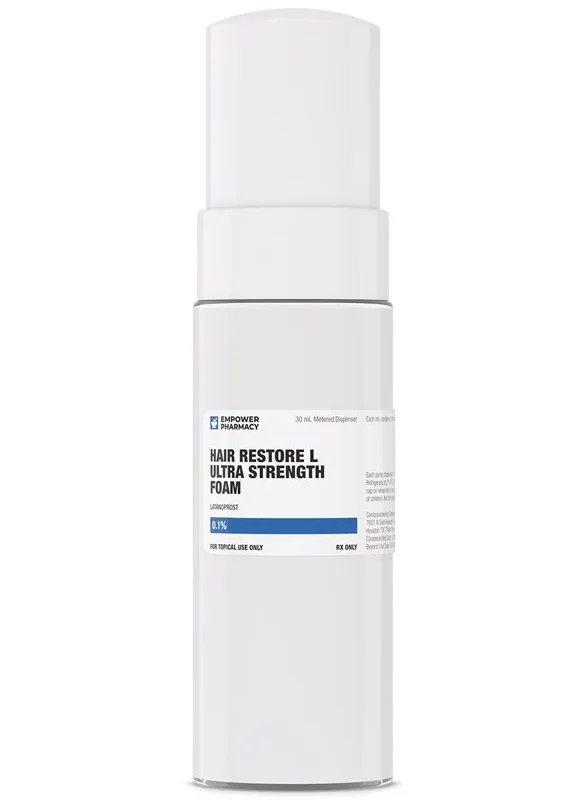 A white bottle with a blue lid, the best treatment for hair loss, on a white background.