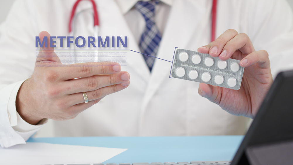 Medical doctor talks about Metformin tablets in his office