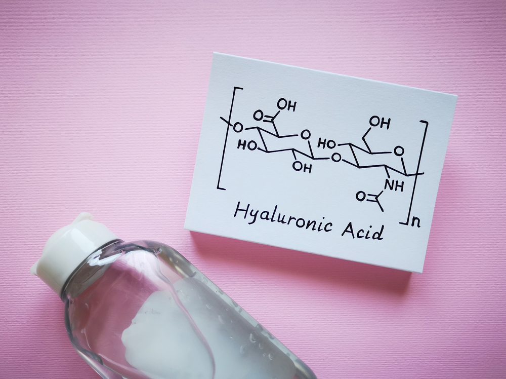 Structural chemical formula of hyaluronic acid macromolecule with liquid hyaluronic acid gel or serum