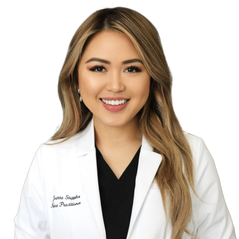 Woman with long, light brown hair wearing a white lab coat and black shirt, smiling at the camera against a white background.